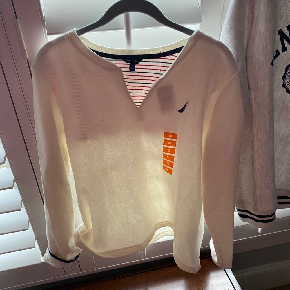 women’s sweater can be dressed up or dressed down.